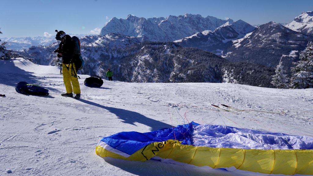 BASE jump from a paraglider in winter